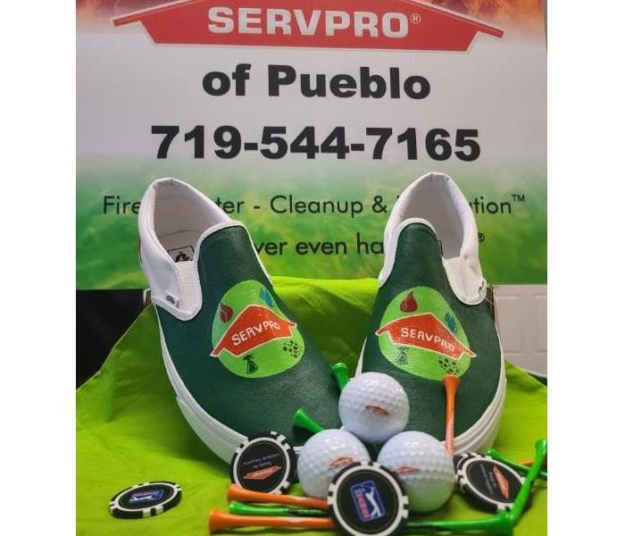 SERVPRO custom Van shoes with golf swag