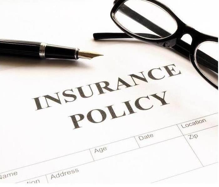 Image of a paper with the title "Insurance Policy"