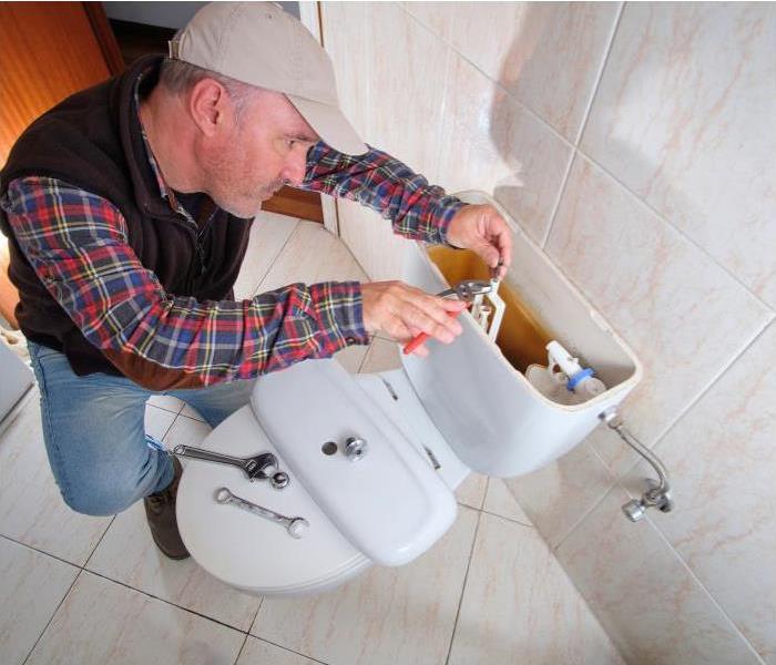 Professional fixing toilet